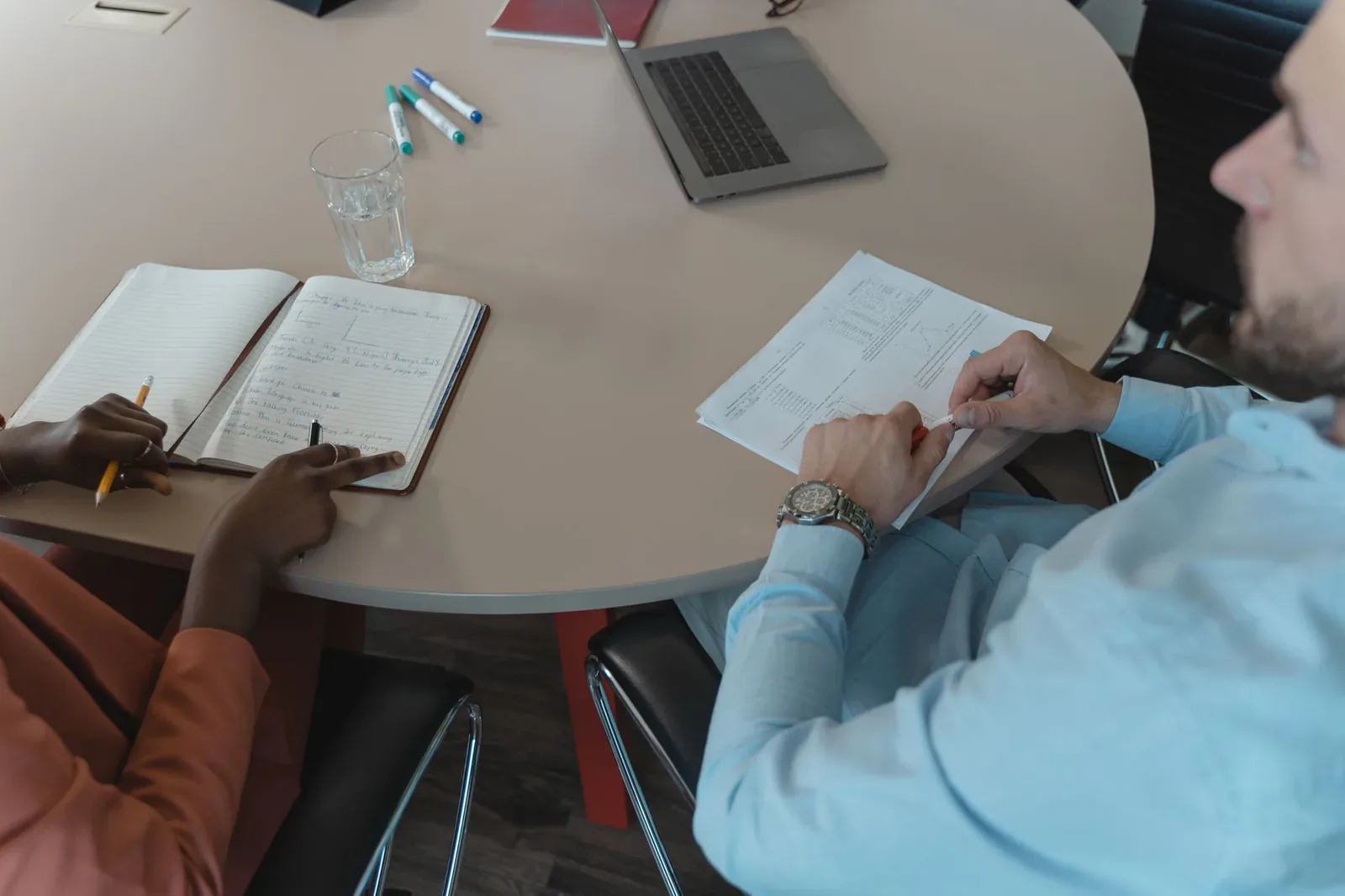 Analysts reviewing policy documents at the Institute